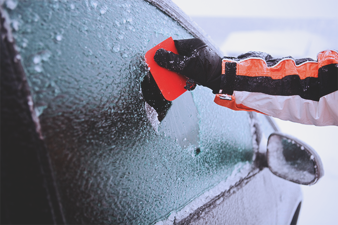 Scraping-Ice-Off-Window-With-Credit-Card