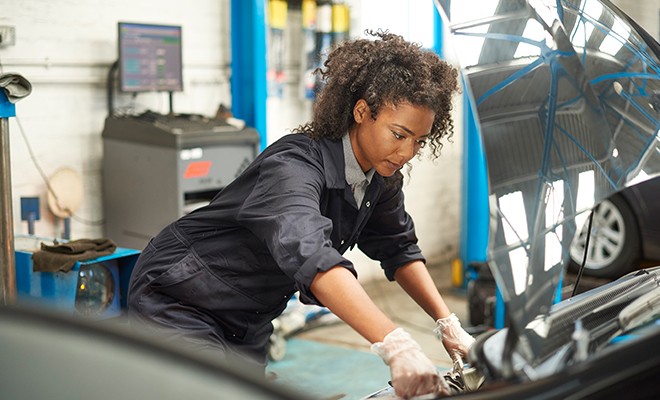 Female-Mechanic-Working-On-Car