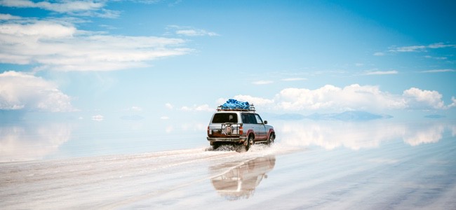SUV-On-Water-Covered-Road